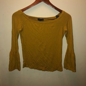 Mustard yellow shirt with flared sleeves